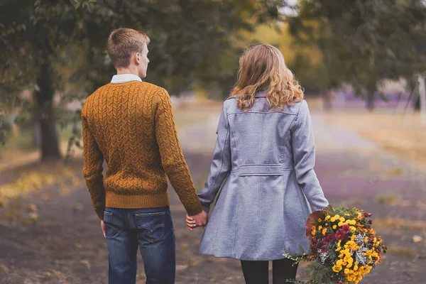 Portrait of back couple hold hands, love each other in soft warm — Stock Photo, Image