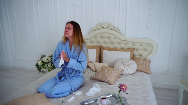 Women Caught Cold and Treated With Medication and Sitting on Large Bed in Bedroom. — Stock Video