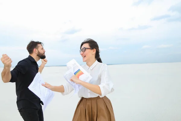 law students man and woman rejoice at passing exams dancing