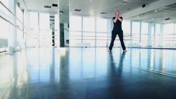 Hip hop dancer training at gym studio in slow motion — Stock Video