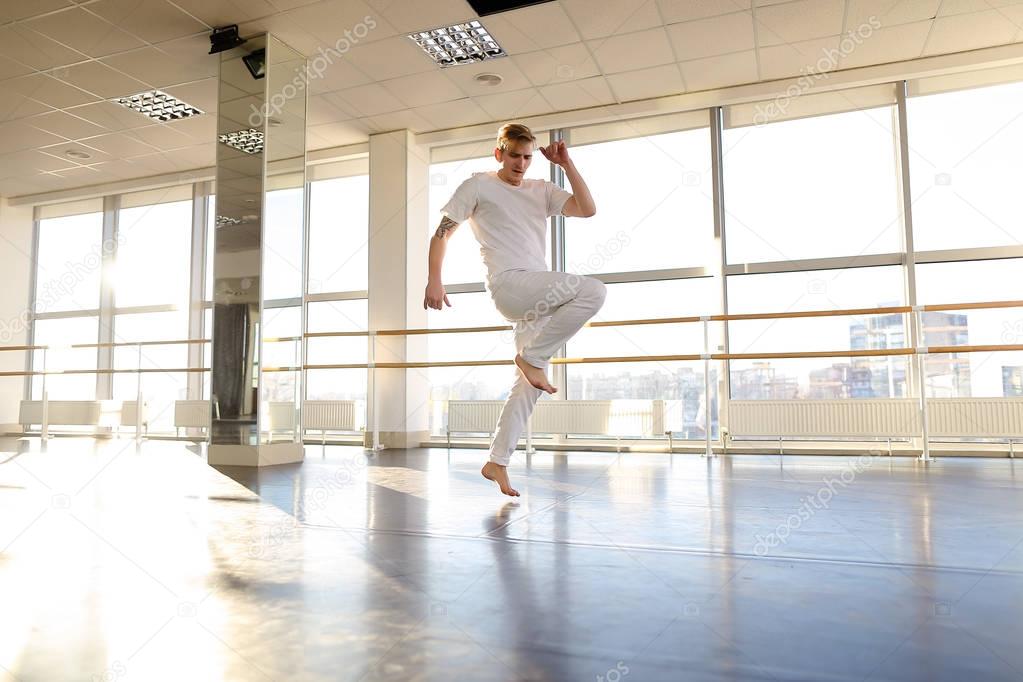 Rehabilitation specialist in sportswear dance during photoshoot