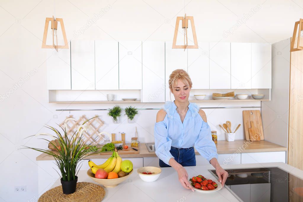 Stylish girl cooks posing for breakfast in morning, standing at