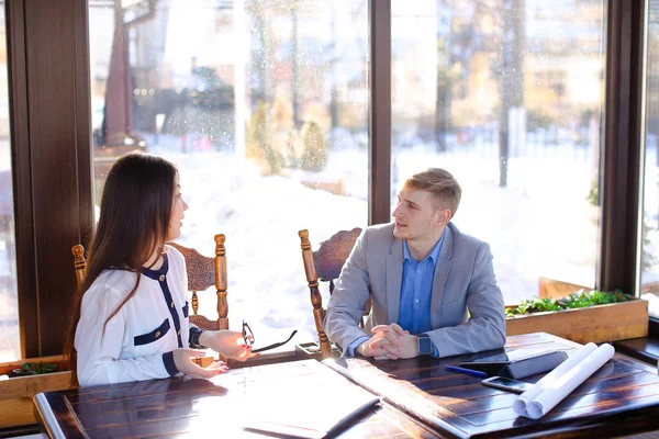 Young secretary refusing in handshaking with boss at cafe. — Stock Photo, Image