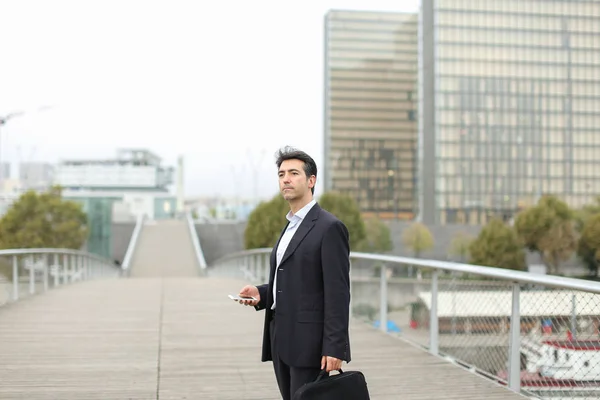 Lawyer man in business clothes waiting for client using smart