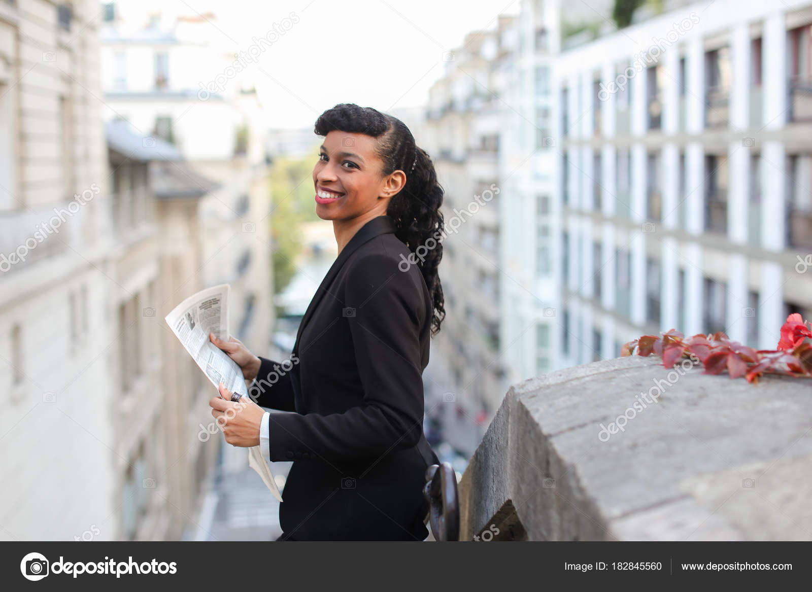 Half Nigerian Reporter Looking At Cam With Newspaper On Balcony Stock Photo Half Nigerian Reporter Looking At Cam With Newspaper On Balcony Stock Photo