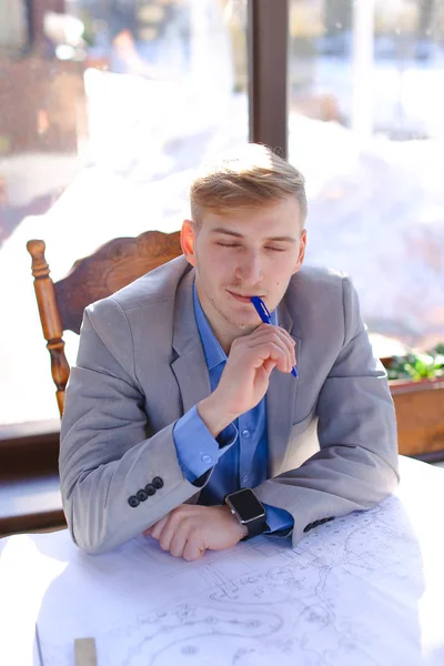 Student working about architectural project at cafe. — Stock Photo, Image