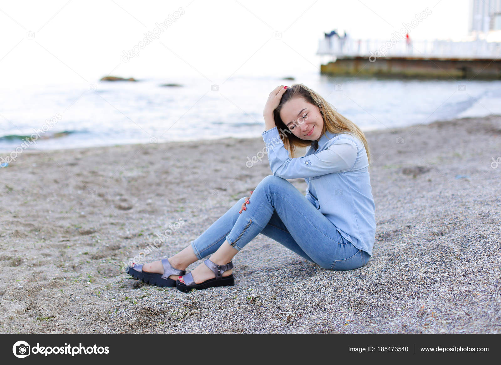 images Jeans Poses For Girls On Beach https depositphotos com 185473540 stock photo smiling young woman rests on html