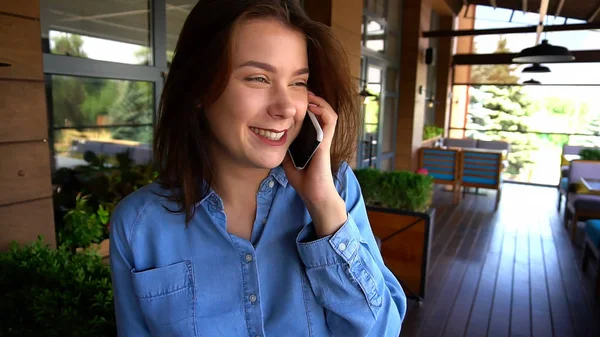 Gorgeous girl talking at cafe with boyfriend