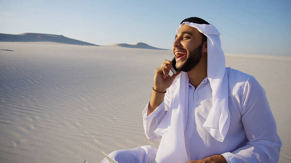 Handsome Arabian UAE Sheikh guy businesswoman calling business p