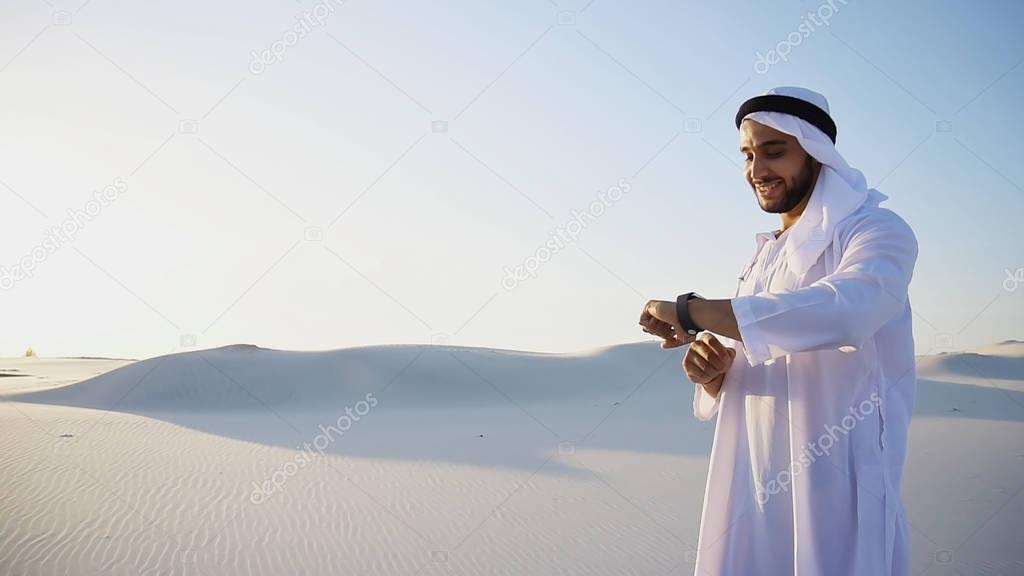 Portrait of handsome Arab businessman who experiencing new smart
