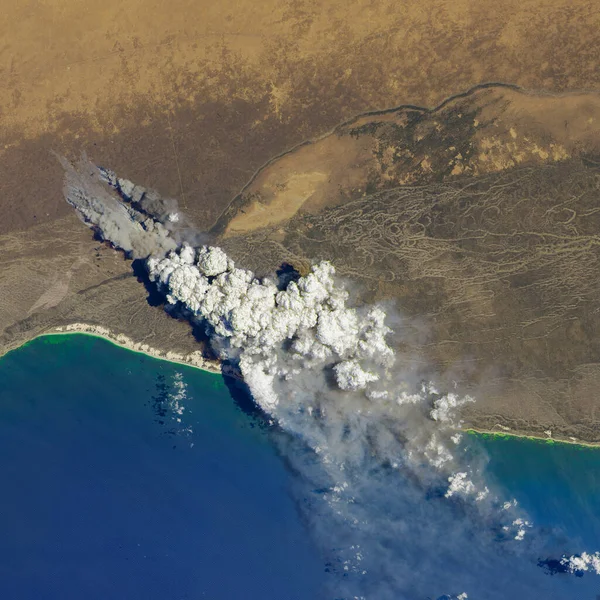 Wildfire from aerial. Fire and smoke. Forest fire. (Elements of this image furnished by NASA)