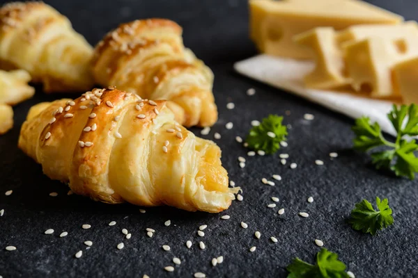 Savory croissants stuffed with Emmental cheese — Stockfoto