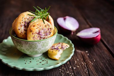 Salty pies with red onion and cumin clipart
