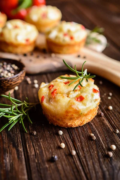 Savory muffins with Feta cheese, curd, pepper and herbs — Stock Photo, Image