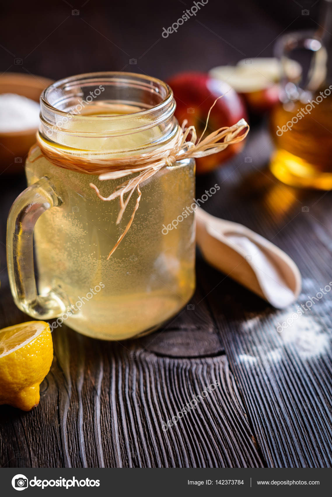 Apple cider vinegar, lemon and baking soda drink Stock Photo by