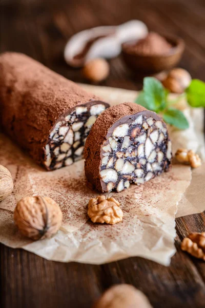 Chocolate Salami - traditional dessert with walnut and biscuits — Stock Photo, Image