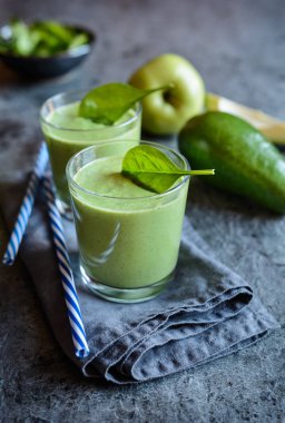 Healthy avocado, spinach and apple smoothie clipart