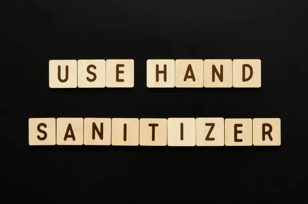 Χρηση Hand Sanitizer Λέξεις Από Ξύλινα Μπλοκ Γράμματα Κάτοψη Μαύρο — Φωτογραφία Αρχείου