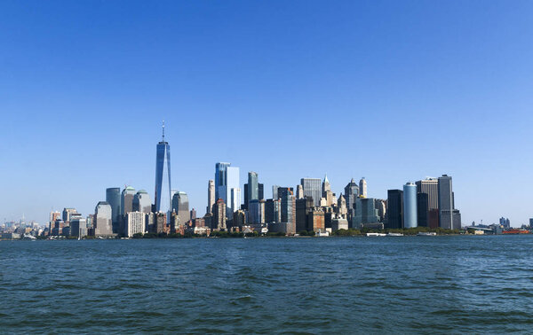 View of Manhattan island skyscrapers from the sea side