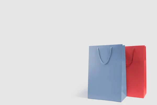 Blue Red Shopping Bags White Background Copy Space — Stock Photo, Image