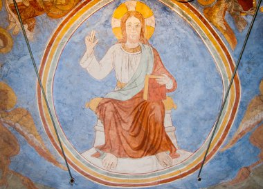 Majestas domini. Bir tahtta oturan İsa'nın Ortaçağ duvar resmi.