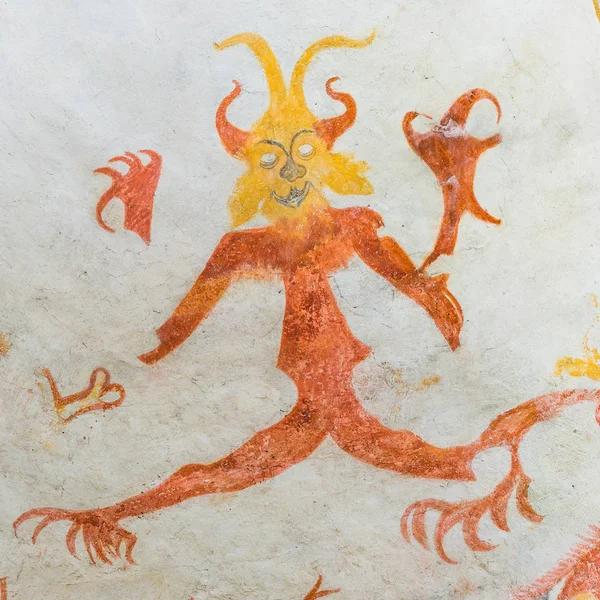 Diablo con grandes garras, un mural medieval — Foto de Stock