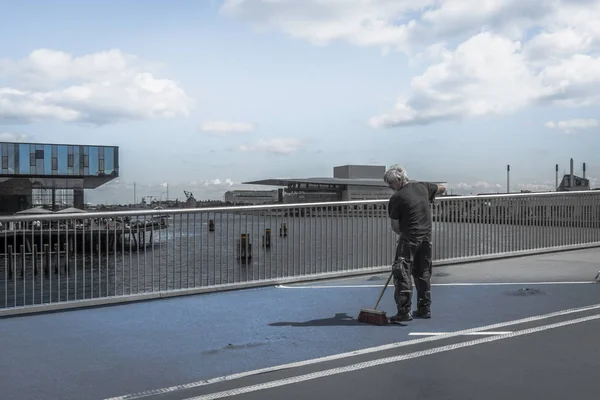 Repairing the slippery surface of the inner port bridge in Copenhagen