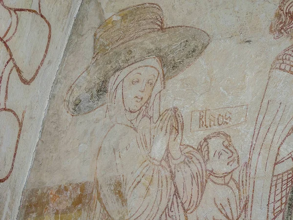 Величезний середньовічний капелюх, Перніл Тотт і її син Клаос. — стокове фото