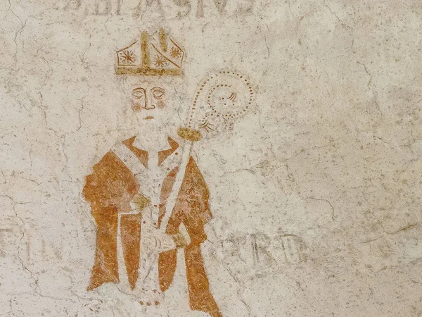 Saint Blaise, een oude bisschop op een muurschildering i Sallerup Ch — Stockfoto