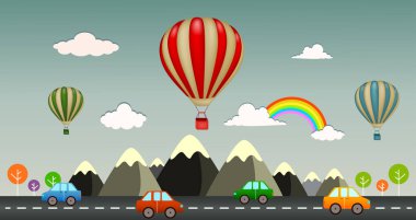 Ülkenin dağlarındaki sıcak hava balonunun resmi.