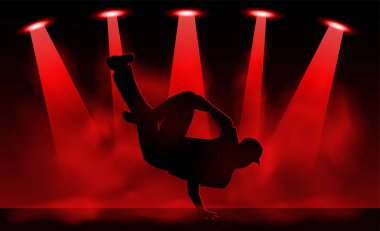 Siyah arka planda dans eden bir dansçının silüeti.