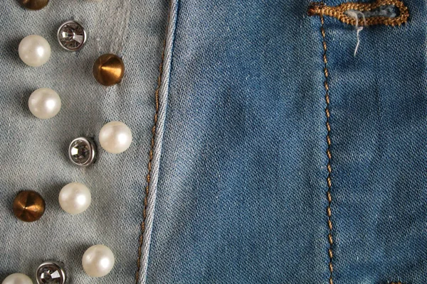 Denim with studs, beads, stones background — Stock Photo, Image