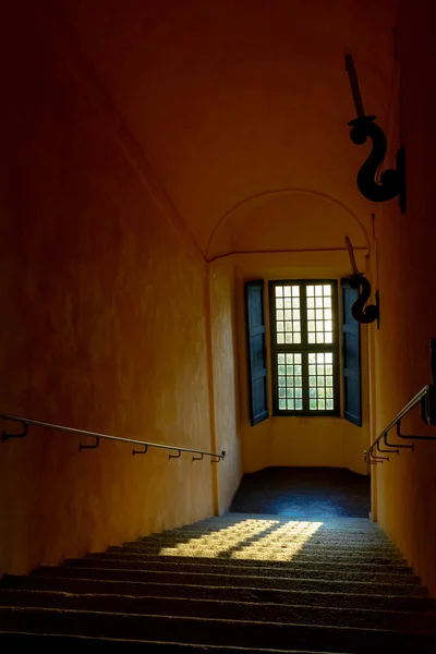 Sunny window in an ancient fortress..Italy, Angera. Castle Rocca di Angera. Toning — Stock Photo, Image