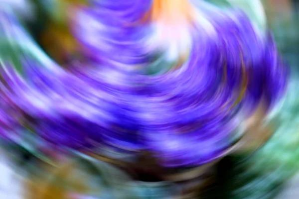 Abstracte bewegende achtergrond met lila en groen kleuren. — Stockfoto