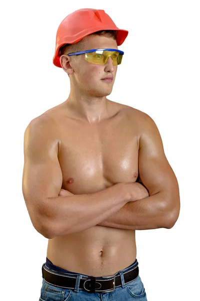 Porträtt av en atletisk man i en röd konstruktion hjälm och goggles. Toning — Stockfoto