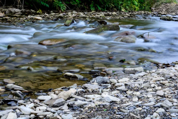 Mountain river with clean cold water and stones — Stock Photo, Image