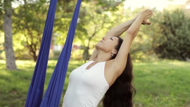 Practice of anti gravity fly yoga with hammock — Stock Video