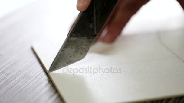 Closeup furniture knife cutting plywood board — Stock Video