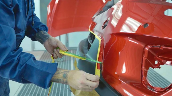 Car bumper after painting in a cars spray booth. Auto vehicle primer bumper. — Stock Photo, Image