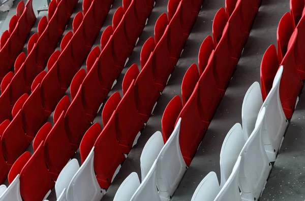 Rows of red and white football stadium seats — Stock Photo, Image