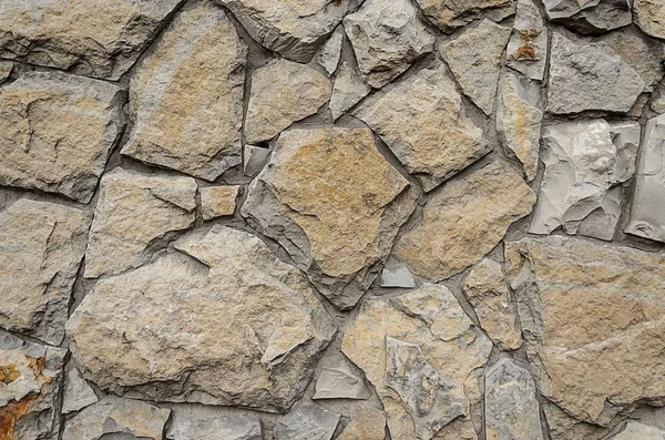 Nahtlose Textur Steinmauer. natürliche nahtlose Hintergrund. Steinmauer aus Flussstein Stockbild