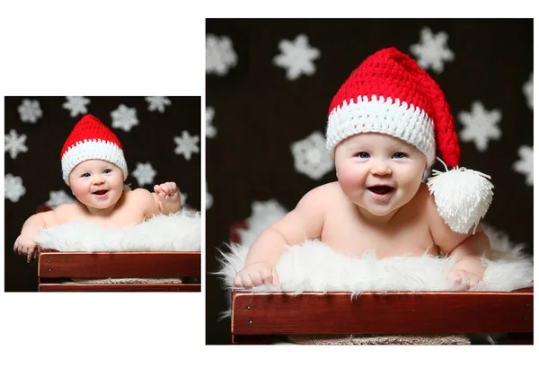 Возбужденный рождественский ребенок сидит в белой деревянной коробке в красной хвостовой шляпе — стоковое фото