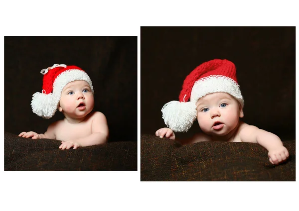 Um bebê de Natal com a boca aberta vestindo um chapéu de Natal vermelho e branco — Fotografia de Stock