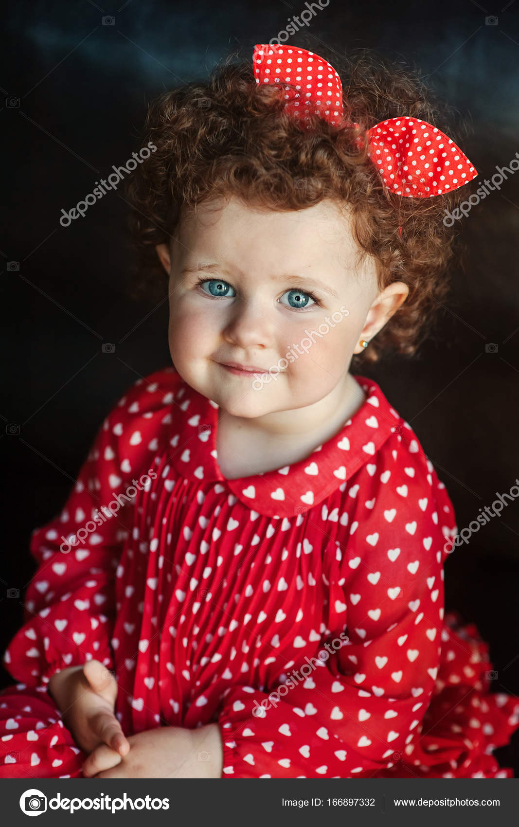 Little girl with ribbon in hair Stock Photo by ©volkovich_a 166897332