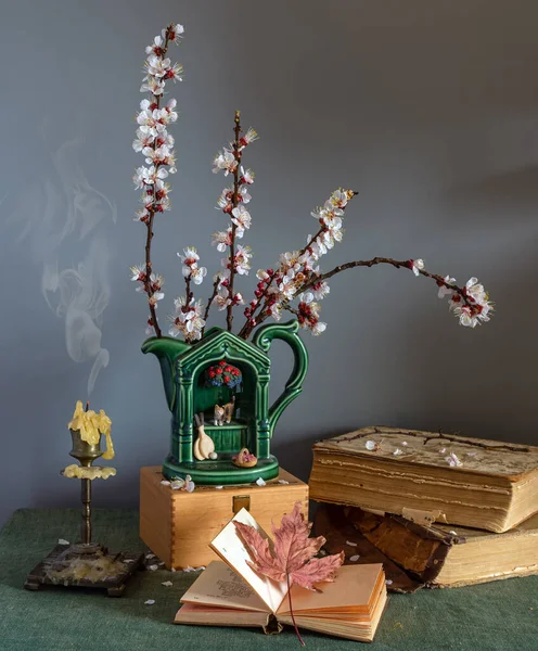 Still Life Flowering Apricot Branches Books Extinguished Candle Vintage — Stock Photo, Image