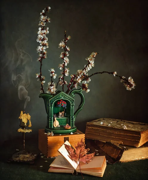 Still Life Flowering Apricot Branches Books Extinguished Candle Vintage — Stock Photo, Image