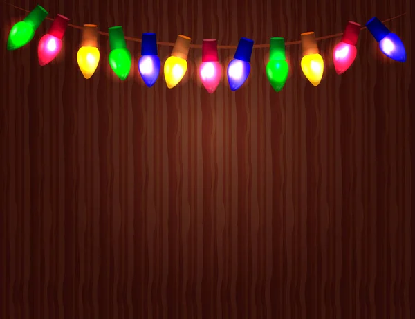 Cadena de bombillas de Navidad de color sobre fondo de madera . — Archivo Imágenes Vectoriales