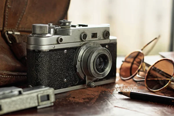 Vintage camera and exposure meter — Stock Photo, Image