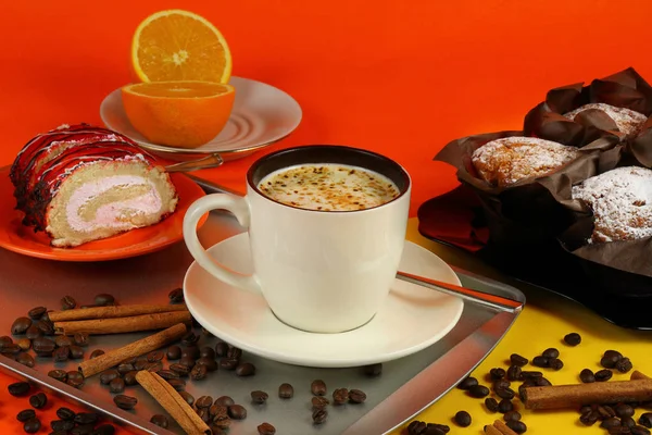 Cup of coffee with muffins, rolls and orange — Stock Photo, Image