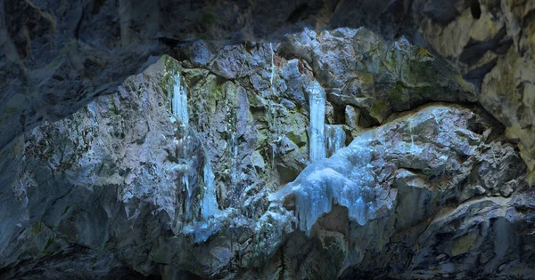 Ice on rocks in the cave — Stock Photo, Image
